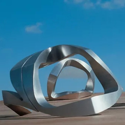 Sculptures modernes abstraites en acier inoxydable de boucle en métal de jardin pour extérieur