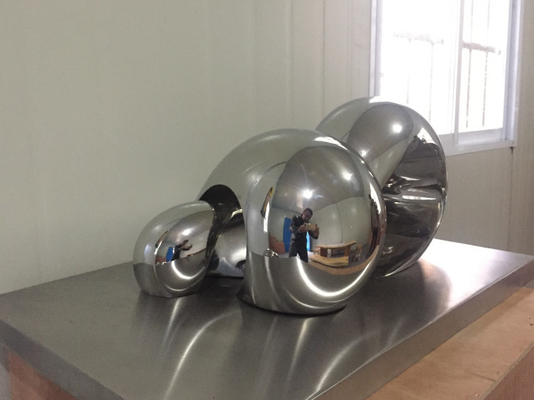 Le décor de maison d'OEM sculpte la sculpture polie par miroir abstrait en acier inoxydable