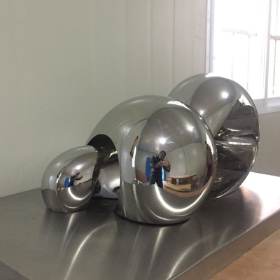 Le décor de maison d'OEM sculpte la sculpture polie par miroir abstrait en acier inoxydable