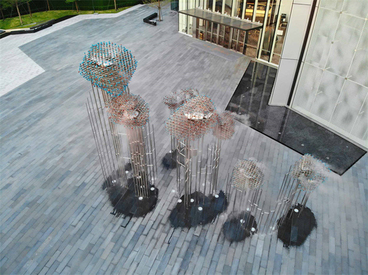 Les sculptures en acier inoxydable de poissons de miroir d'école ont poli adapté aux besoins du client